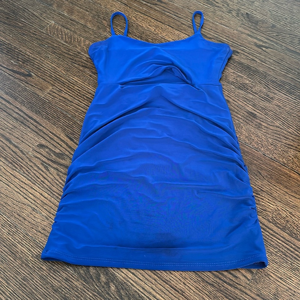 Cheryl creations. Blue tank dress with center cut out. Like new. Kids medium